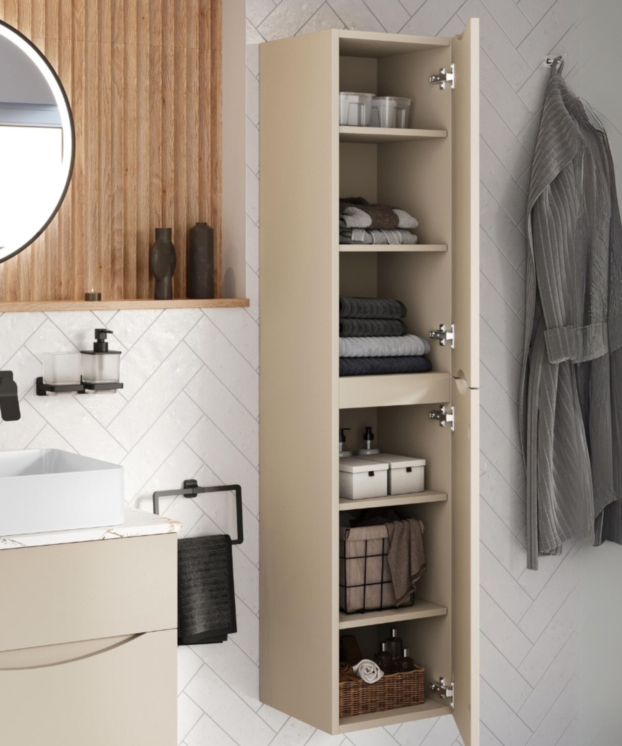 A slim wall-mounted cabinet in soft beige provides vertical towel storage. Inside, neatly folded towels and baskets keep essentials organised, while a grey robe hangs nearby.