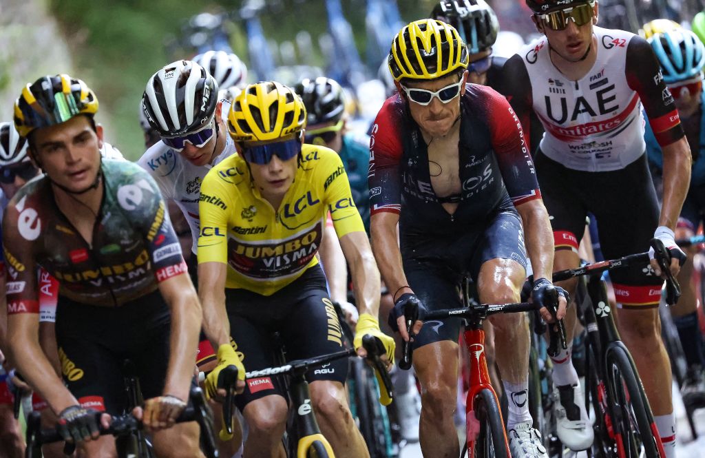 JumboVisma teams American rider Sepp Kuss L JumboVisma teams Danish rider Jonas Vingegaard wearing the overall leaders yellow jersey 2nd L and Ineos Grenadiers teams British rider Geraint Thomas 2nd R cycle in the pack of riders during the 18th stage of the 109th edition of the Tour de France cycling race 1432 km between Lourdes and Hautacam in the Pyrenees mountains in southwestern France on July 21 2022 Photo by Thomas SAMSON AFP Photo by THOMAS SAMSONAFP via Getty Images