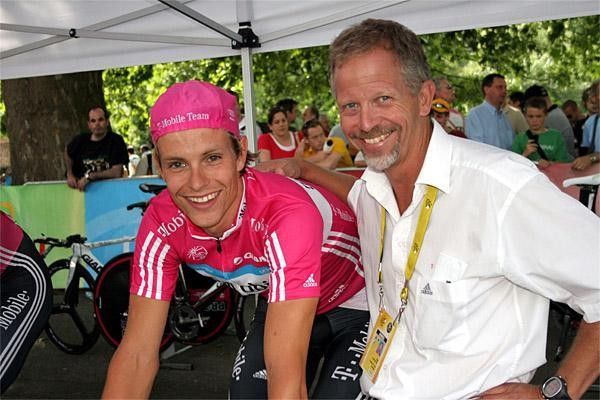 Bob Stapleton stands behind his riders