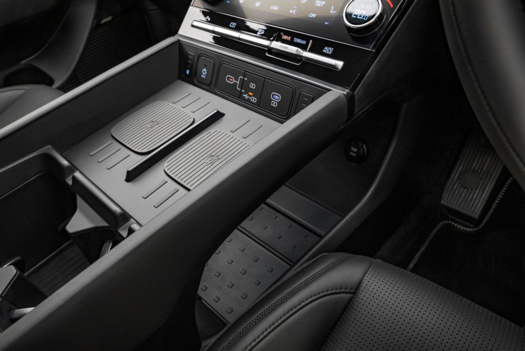 Attention to detail is first rate, from storage to twin phone chargers in the front