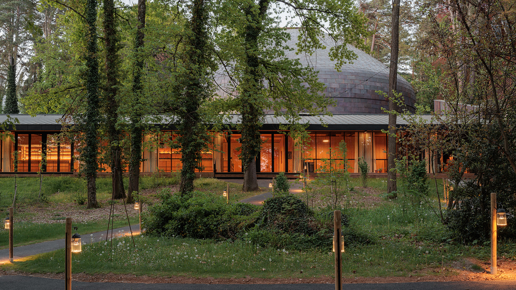Evian concert hall, La Source Vive, all organic forms in the woods