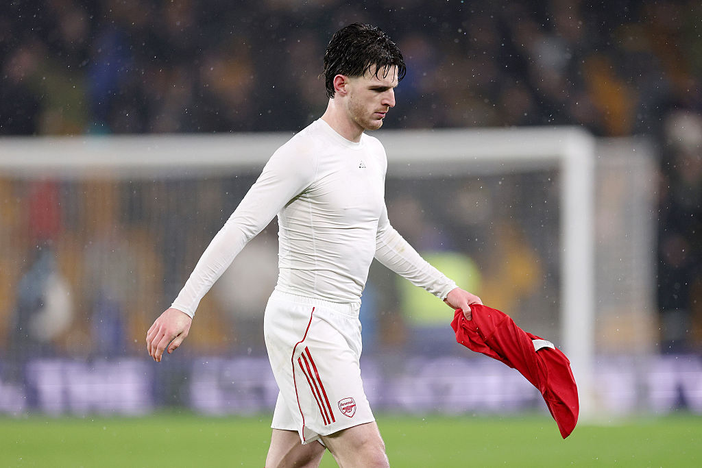 Declan Rice of Arsenal looks dejected at full time following the draw during the Premier League match between Wolverhampton Wanderers and Arsenal at Molineux on February 18, 2026 in Wolverhampton, England.