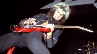 George Lynch and American singer and musician Don Dokken, of the American glam metal band Dokken, perform on stage during a concert circa 1983 in San Francisco, California.