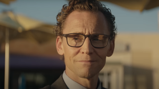 Tom Hiddleston smiling in The Life Of Chuck