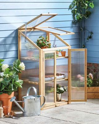 This design by Gardenline from Aldi is made with 100% sustainable fir wood – and comes with three storage shelves and lifting lids.