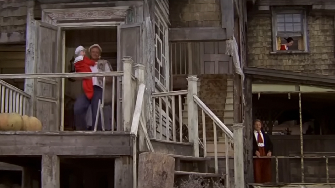 The set of Popeye with the cast standing throughout