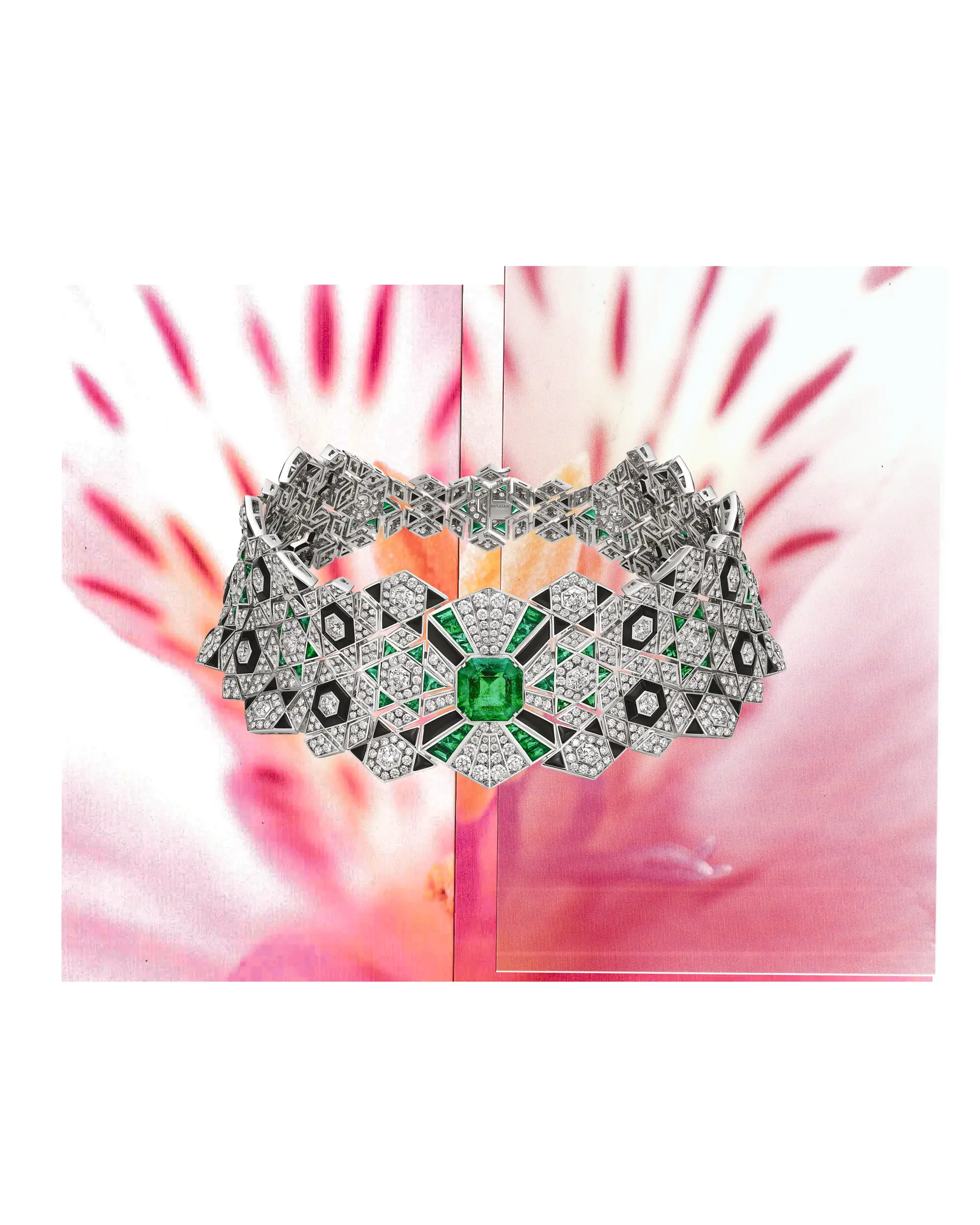 A detailed necklace of diamonds and emeralds in a choker style