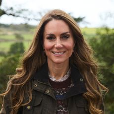 Princess Kate wearing a fair isle sweater and smiling