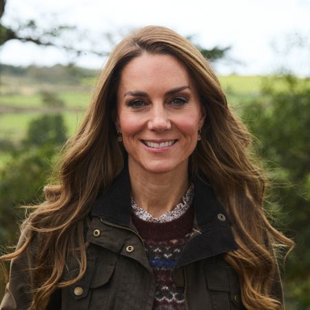 Princess Kate wearing a fair isle sweater and smiling