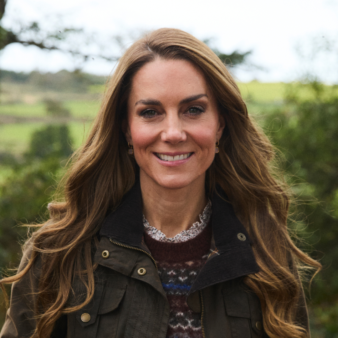 Princess Kate wearing a fair isle sweater and smiling