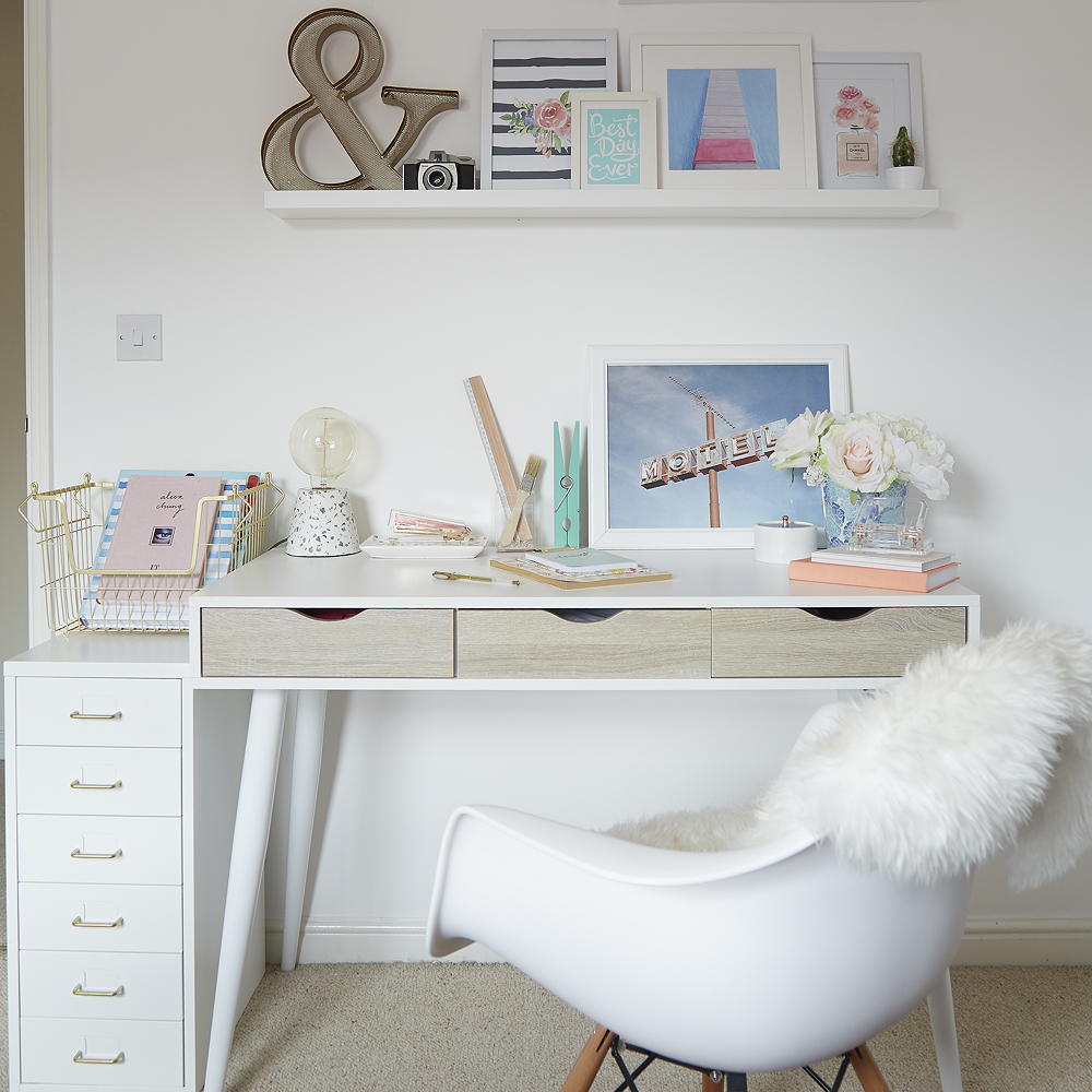 study room with white desk white wall and chair