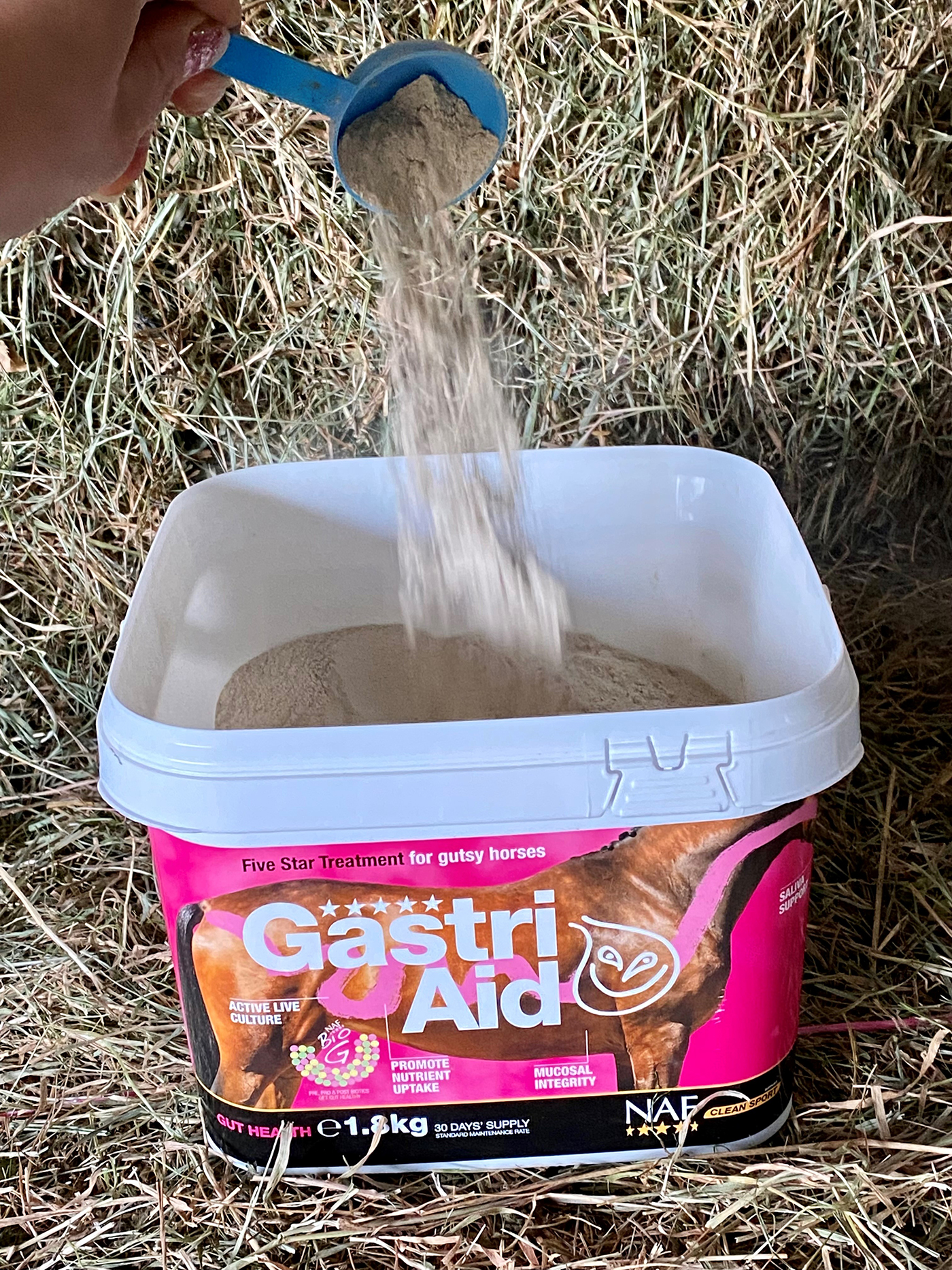 An open tub of NAF Gastri-Aid supplement