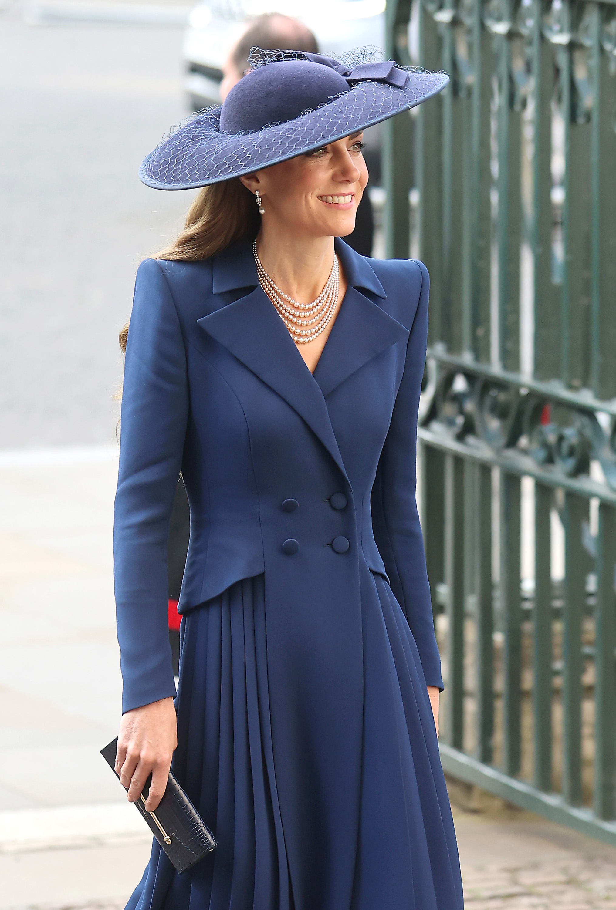 Princess Kate wearing a blue coat dress and hat