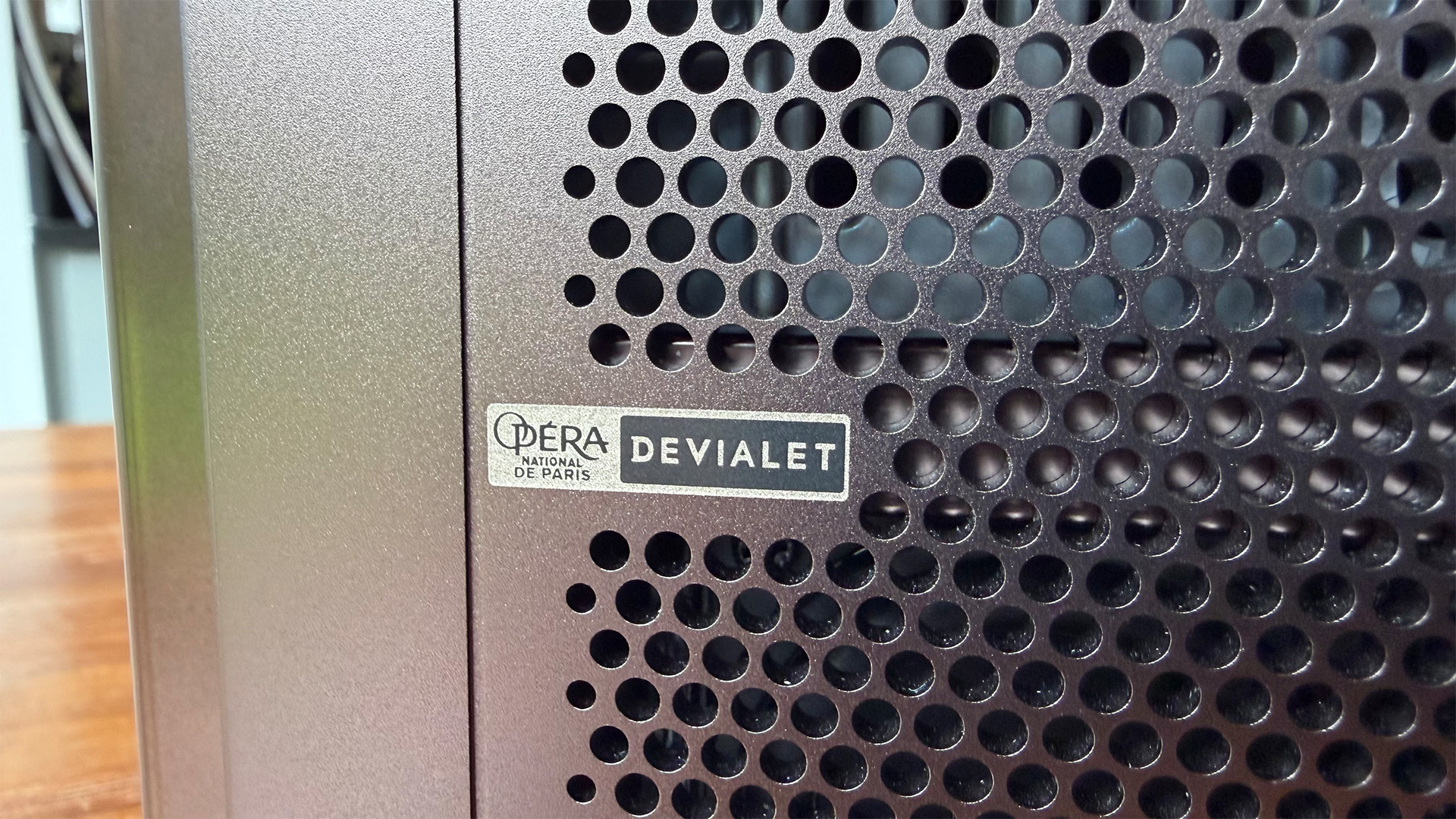 Hisense XR10 home cinema projector close. up on rear speaker grille
