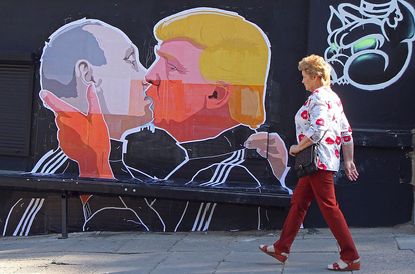 A mural in Lithuania depicts Vladimir Putin and Donald Trump kissing