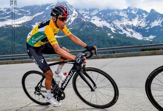 Egan Bernal rides in the mountains during stage 7 at tour de Suisse