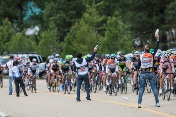 Riders roll through the feed zone