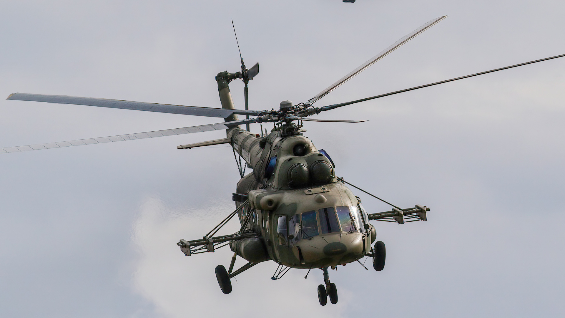 MOSCOW, RUSSIA - 2021/08/24: Russian Air Force Mil Mi-8 and Kamov Ka-52 "Alligator" attack helicopter fly during the annual Army Games defense technology international exhibition. The International Army Games is an annual Russian military sports event organized by the Ministry of Defense of Russia. The event, which was first staged in August 2015, involves close to 30 countries taking part in dozens of competitions over two weeks to prove which is the most skilled. Dynamic demonstration is a part of the Army Games public display. (Photo by Leonid Faerberg/SOPA Images/LightRocket via Getty Images)