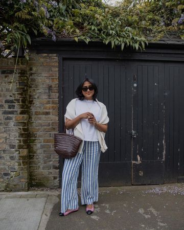 When It's Too Hot for Jeans Stylish Women Turn to Stripe Linen Trousers ...