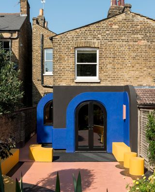a bold, but small colourful side return kitchen extension to the rear of a property