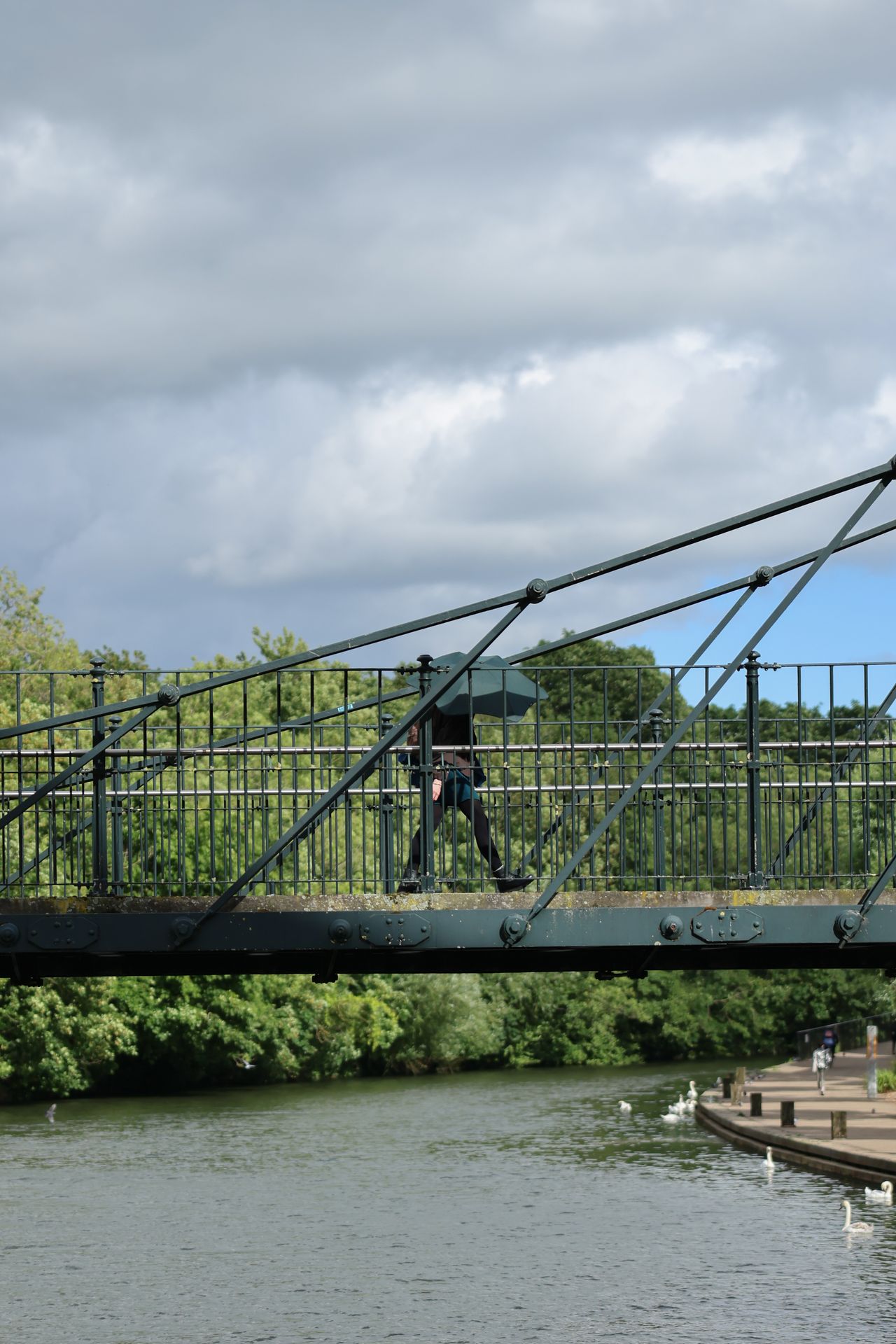 A photo of a person on a bridge taken on a Canon EOS R6 Mark III