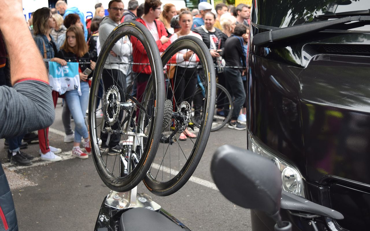 The Team Ineos scooter had spare disc brake wheels and a bidon on the rear rack, although no team riders were racing on discs