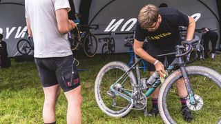 A Canyon bike being cleaned by a mechanic