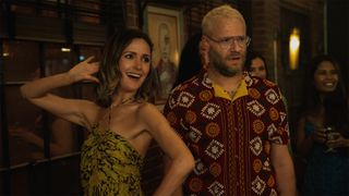 Sylvia (Rose Byrne) and Will (Seth Rogen) at a party in Platonic.