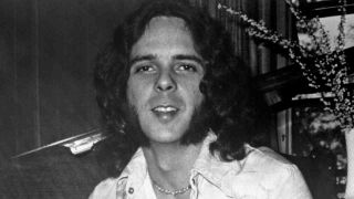 Derek And The Dominos keyboard player Bobby Whitlock posing for a photograph in 1972