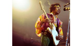 American rock guitarist and singer Jimi Hendrix (1942-1970) performs live on stage playing a white Fender Stratocaster guitar with The Jimi Hendrix Experience at the Royal Albert Hall in London on 24th February 1969