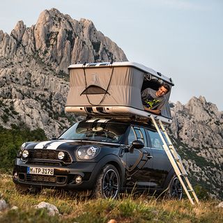 camping safari with black car