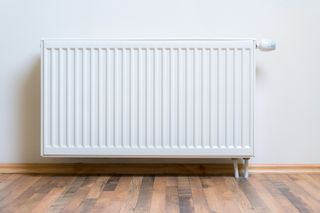 radiator attached to wall