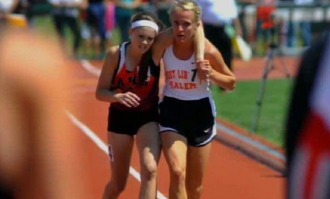 When distance runner Arden McMath (left) collapsed, fellow runner Meghan Vogel (right) helped carry her to the finish line.