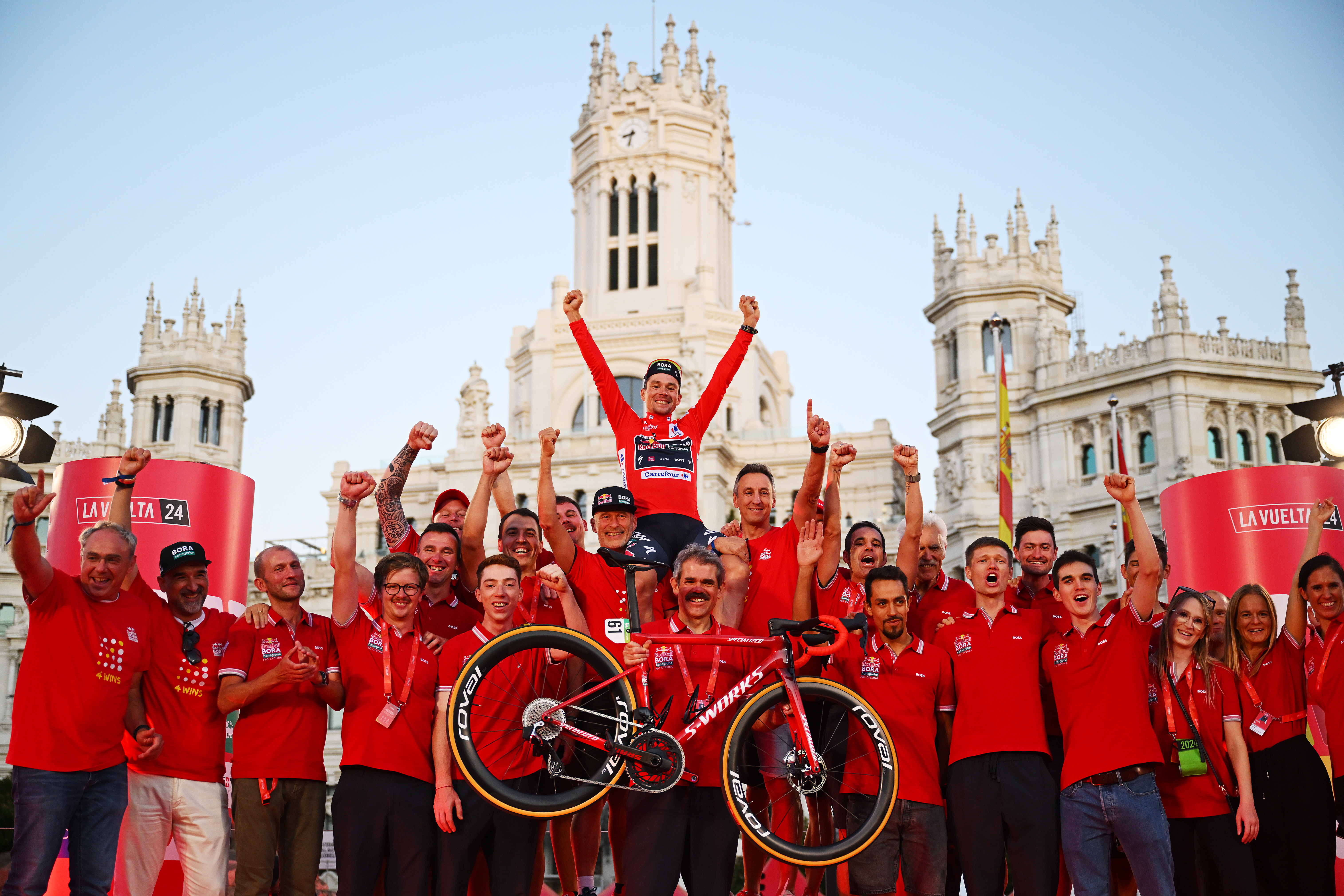 MADRID, SPAIN - SEPTEMBER 08: Final overall winner, Primoz Roglic of Slovenia - Red Leader Jersey and Team Red Bull Bora - hansgrohe celebrate at podium during the La Vuelta - 79th Tour of Spain 2024, Stage 21 a 24.6km individual time trial stage from Madrid to Madrid / #UCIWT / on September 08, 2024 in Madrid, Spain. (Photo by Dario Belingheri/Getty Images)