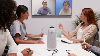 workers in a video conference use one of the best conference room webcams, Meeting Owl Pro 