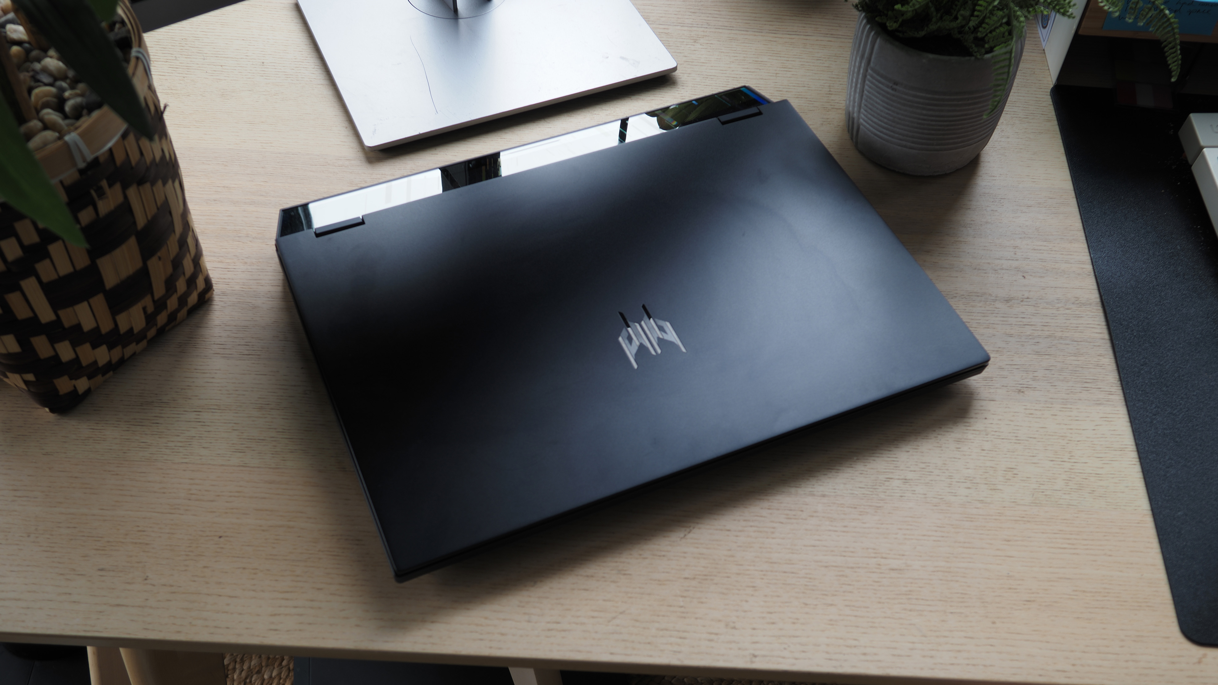 A closed laptop sitting on a desk