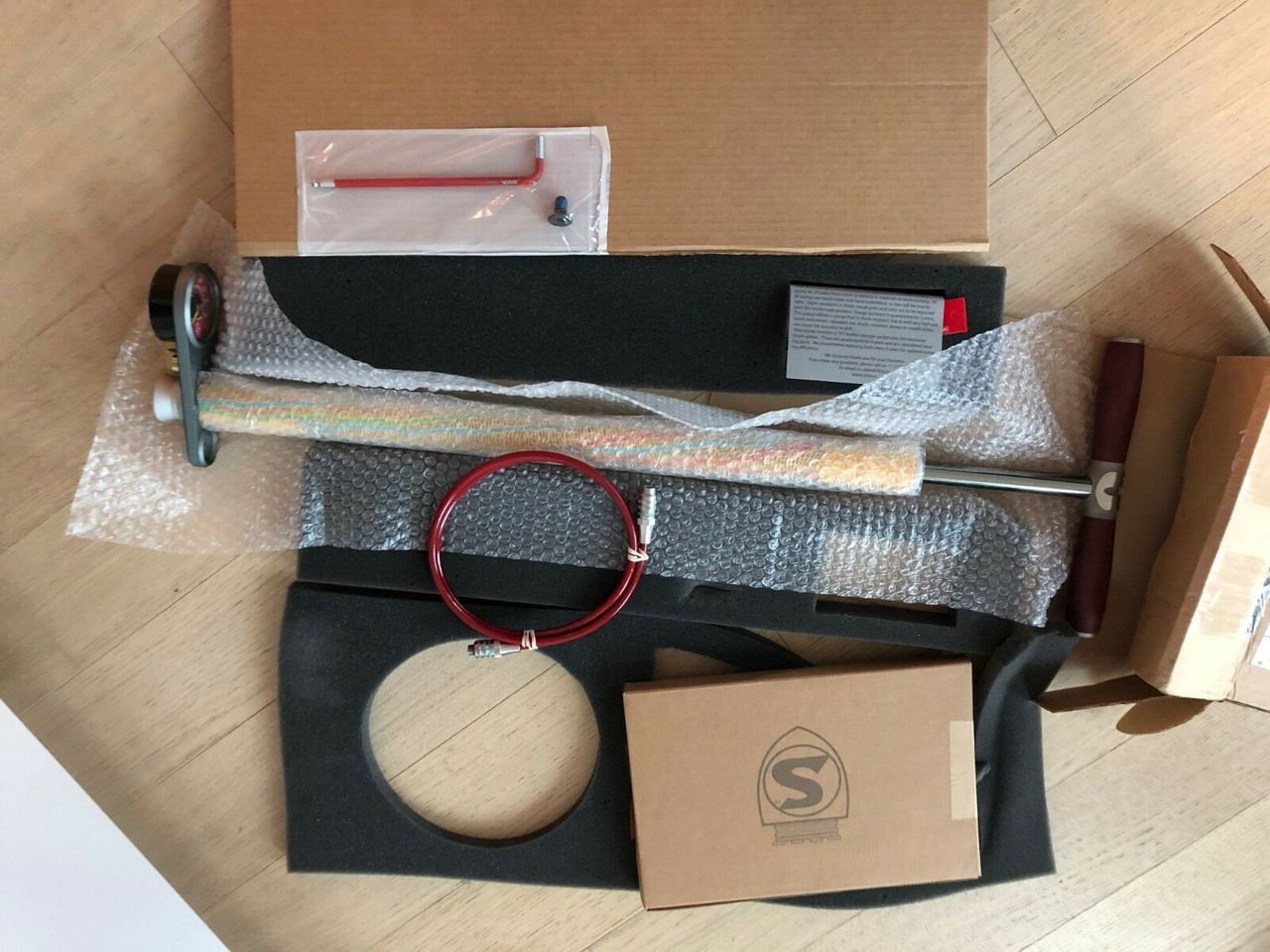 The one-of-a-kind track pump comes new in its box