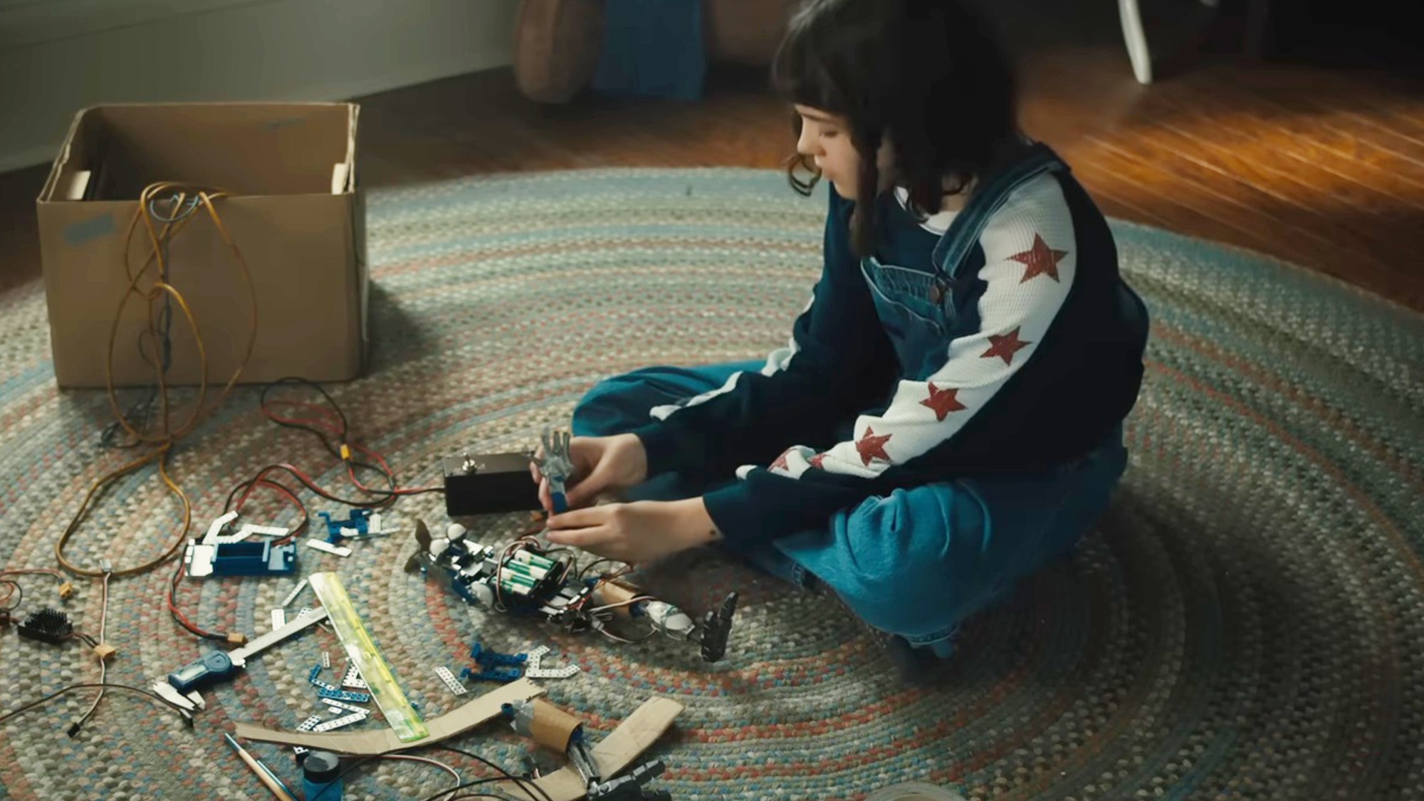 Piper Rubio tinkering with some tools in Five Nights at Freddy's 2