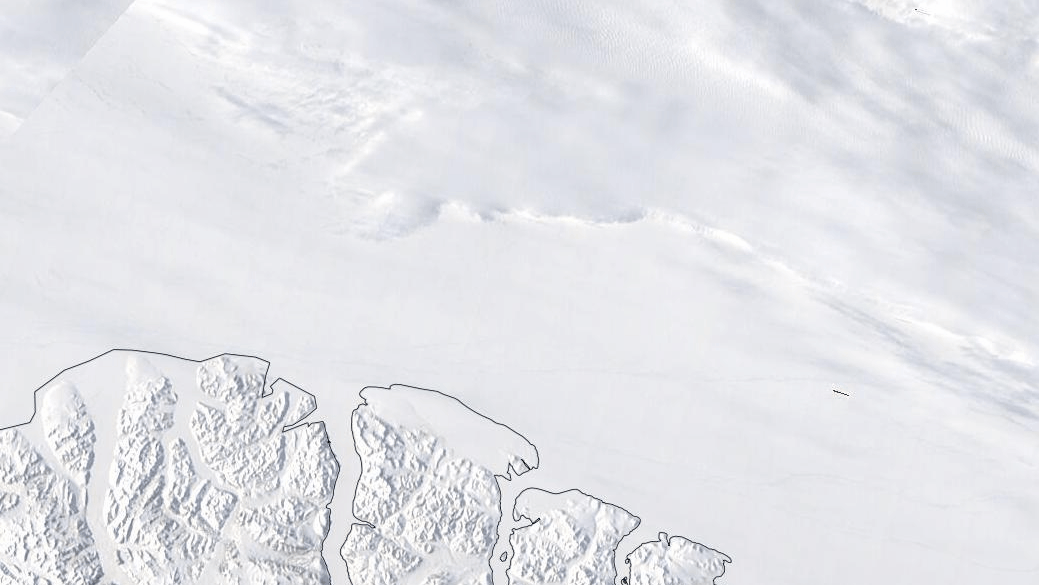 A polynya grows in the Last Ice Area above Canada’s Ellesmere Island. The gap in the ice was open for around two weeks in May 2020 due to strong, anticyclonic winds in the Arctic.