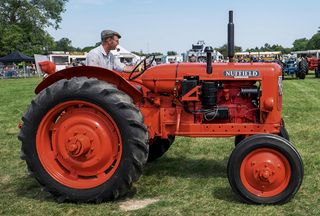 Veteran 1949 Nuffield M4 Universal tractor in arena at Stow cum Quy show ground for Cambridgeshire Steam Rally and Country Fair