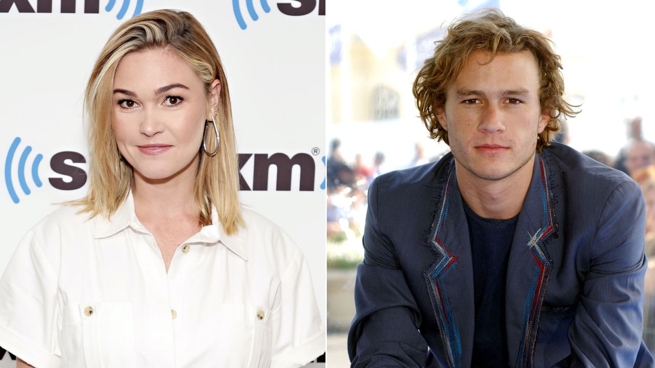 Julia Stiles has blonde hair and wears a white shirt, and Heath Ledger wears a blue blazer and has wavy brown blond hair