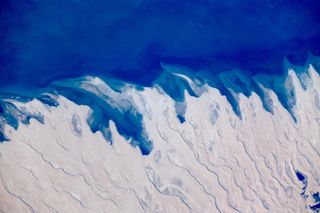 The desert of Kazakhstan, off the coast of the Caspian sea, as seen from the International Space Station by Guy Laliberte.