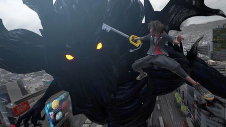 Kingdom Hearts 4 screenshot shows Sora facing off against a huge monster.