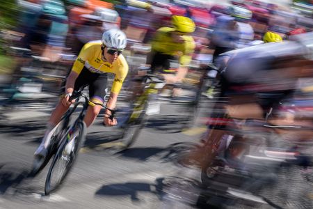 UAE Team Emirates-XRG's Slovenian rider Tadej Pogacar wearing the overall leader's yellow jersey rides with the pack during the second stage of the Tour of Romandie UCI cycling World tour, 173.1 km from Rue to Vucherens, in Vucherens, on April 30, 2026. (Photo by Fabrice COFFRINI / AFP)