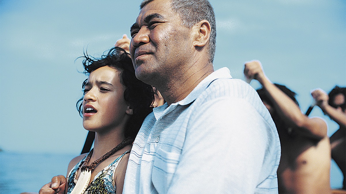 a girl and an older man in a boat together in the movie 'Whale Rider'