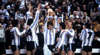 Daniel Passarella, captain of Argentina, lifts the World Cup trophy in 1978.