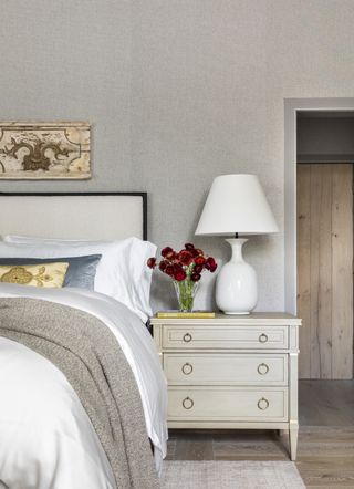 Cozy grey bedroom designed by Marie Flanigan