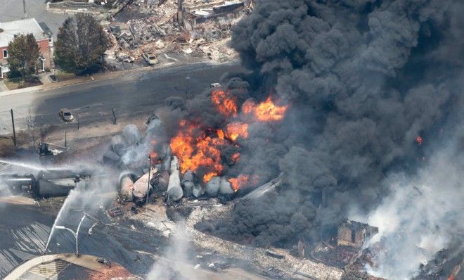 Smoke rises from oil-carrying tankers