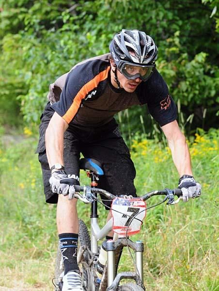 Adam Craig (Giant) is third heading into the singletrack.