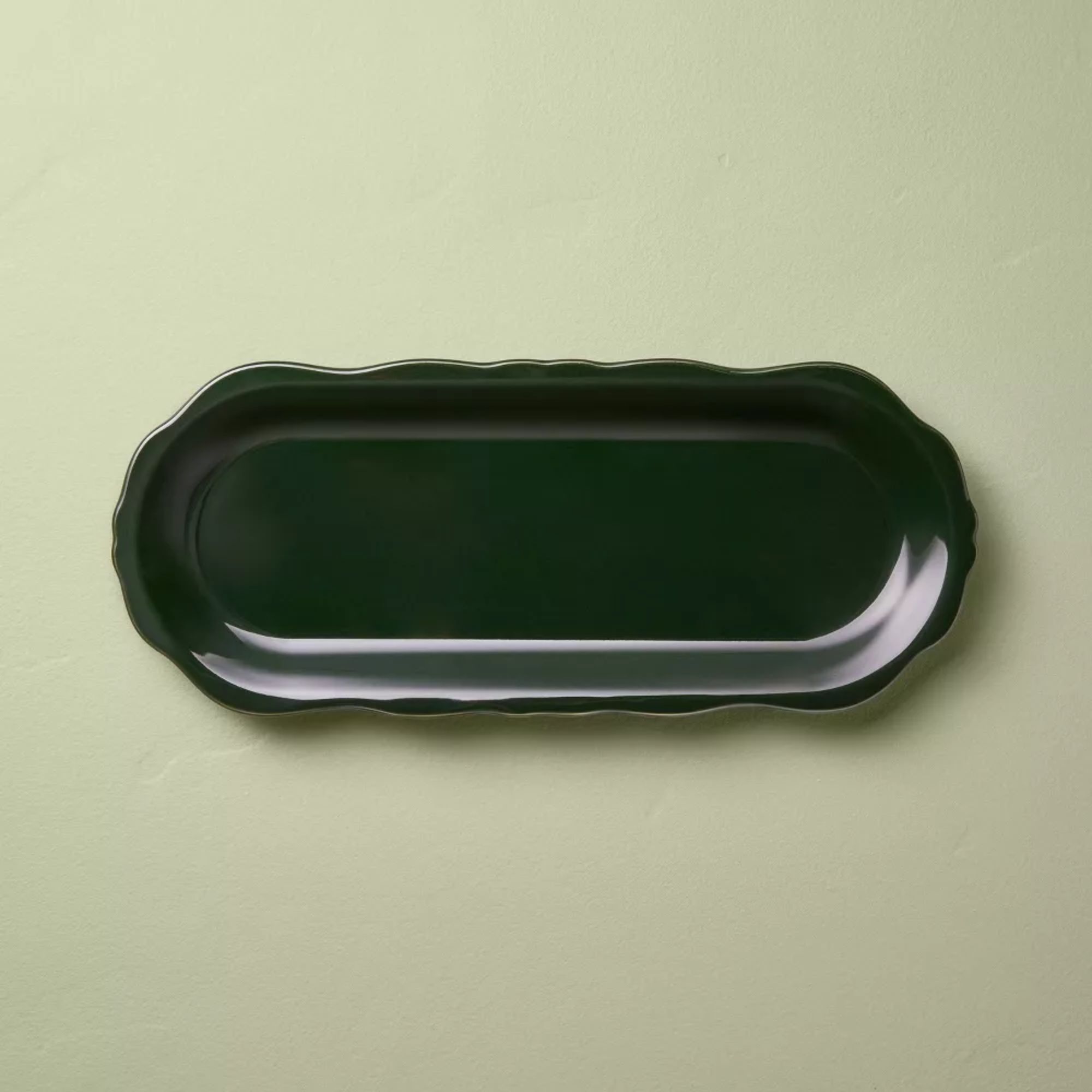 Dark green scalloped platter